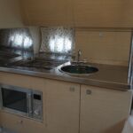 Sessa C30 - Galley with appliances and storage cupboards