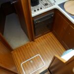 Broom 1070 - Teak & Holly Flooring with storage locker