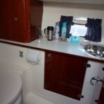 Aquador 32 - Electric toilet with stainless steel wash hand basin