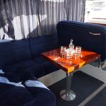Aquador 32 - Saloon seating and dining table