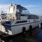 Broom Ocean 42 - Stern view showing bathing platform, ladders, davits and fender baskets