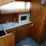 Linssen 41 -Galley comprising electric hob, fridge, microwave and sink