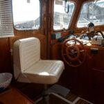 Colvic Beta 40 - Helmseat with sliding side door access