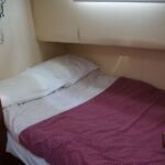 Colvic Beta 40 - Twin midships cabin with double berth, wardrobe and emergency hatch