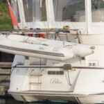 Broom 41 - Stern with bathing platform, ladder, davits, outboard bracket and dinghy.
