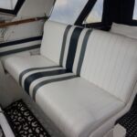 Fairline Carrera 24 - Raised Helmseat flips over converting into cockpit seating