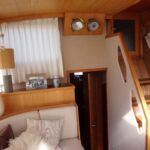 Stevens 1140 - Steps down to the aft master cabin and heads