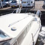 Freeman 33 Sports - Forward deck with grab rails