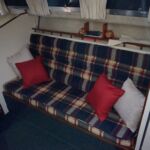 Birchwood 29 Sedan - Bench seat with shelving above