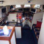 Birchwood 29 Sedan - Steps down into the galley