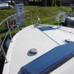 Broom Crown 37 - Forwrd deck with ventialtion caps and fender baskets