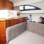 Broom Ocean 38 - Hanging locker and shelving in the forward cabin