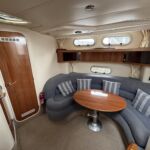 Sealine S34 - Saloon seating and dining table
