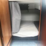 Fairline Carrera 24 - Midships berth with privacy curtain