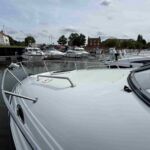 Regal 2665 - Forward deck with stainless steel pulpit and grab rails