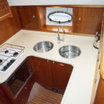 Broom 345 - Teak and holly flooring in the Galley