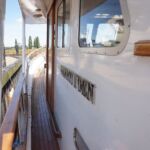 Wide side decks with wooden handrails
