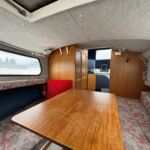 Hardy Pilot 20 - Dining table lowers to make a double berth with infill