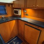 Broom 415 - Appliances include fridge and microwave