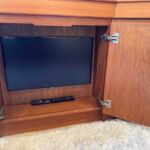 Broom 415 - TV neatly stored within the sideboard