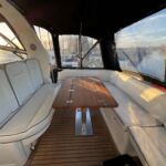 Broom 415 - The dining table extends to create a very sociable area with plenty of seating