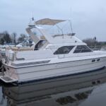 Princess 435 - Katana at mooring with flybridge bimini