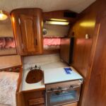 Galley with hob, oven, fridge and sink unit