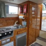 Princess 25 - Galley and Heads opposite the saloon seating