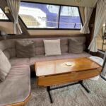 Princess 385 - L-shaped saloon seating with adjustable dining table