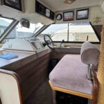 Princess 385 - Steps up to the double helmseat