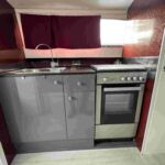Elysian 27 - Modern fitted galley with gas hob, oven and grill.
